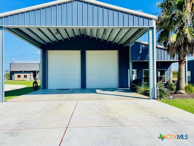 2824 Harrison Avenue Port O'Connor, TX 77982 - Photo 1 of 48 a view of outdoor space and a garage