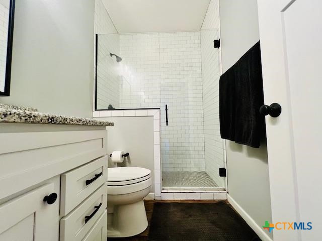 2824 Harrison Avenue Port O'Connor, TX 77982 - Photo 25 of 48 a bathroom with a toilet and a shower