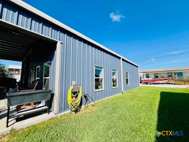 2824 Harrison Avenue Port O'Connor, TX 77982 - Photo 44 of 48 a view of backyard with hardwood area
