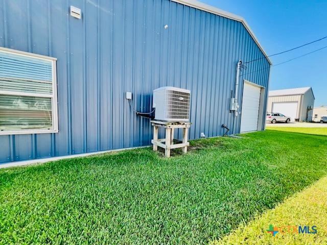 2824 Harrison Avenue Port O'Connor, TX 77982 - Photo 46 of 48 a backyard of a house with table and chairs