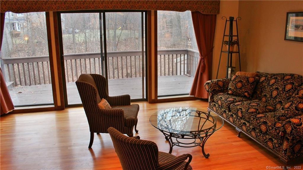 229 Wiese Road Cheshire, CT 06410 - Photo 1 of 1 Living room with view of deck