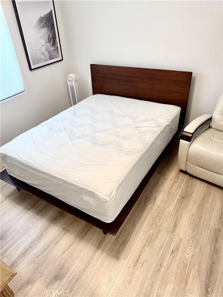 18913 Haas Avenue Torrance, CA 90504 - Photo 11 of 20 a large bed sitting in a bedroom next to a window