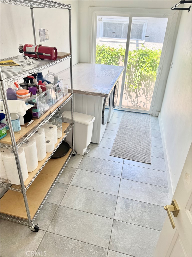 18913 Haas Avenue Torrance, CA 90504 - Photo 14 of 20 a kitchen with stainless steel appliances a stove a sink and a cabinets
