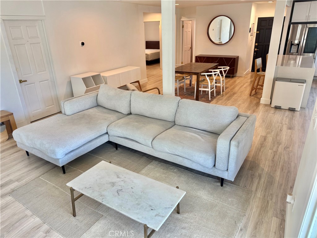 18913 Haas Avenue Torrance, CA 90504 - Photo 19 of 20 a living room with furniture and a flat screen tv