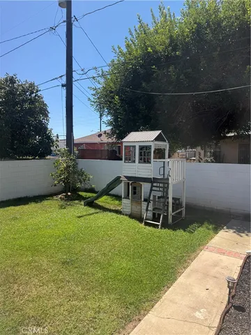 a house view with a garden space