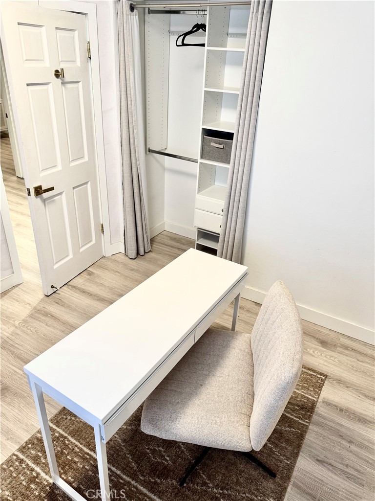 18913 Haas Avenue Torrance, CA 90504 - Photo 9 of 20 a living room with a bed and a refrigerator
