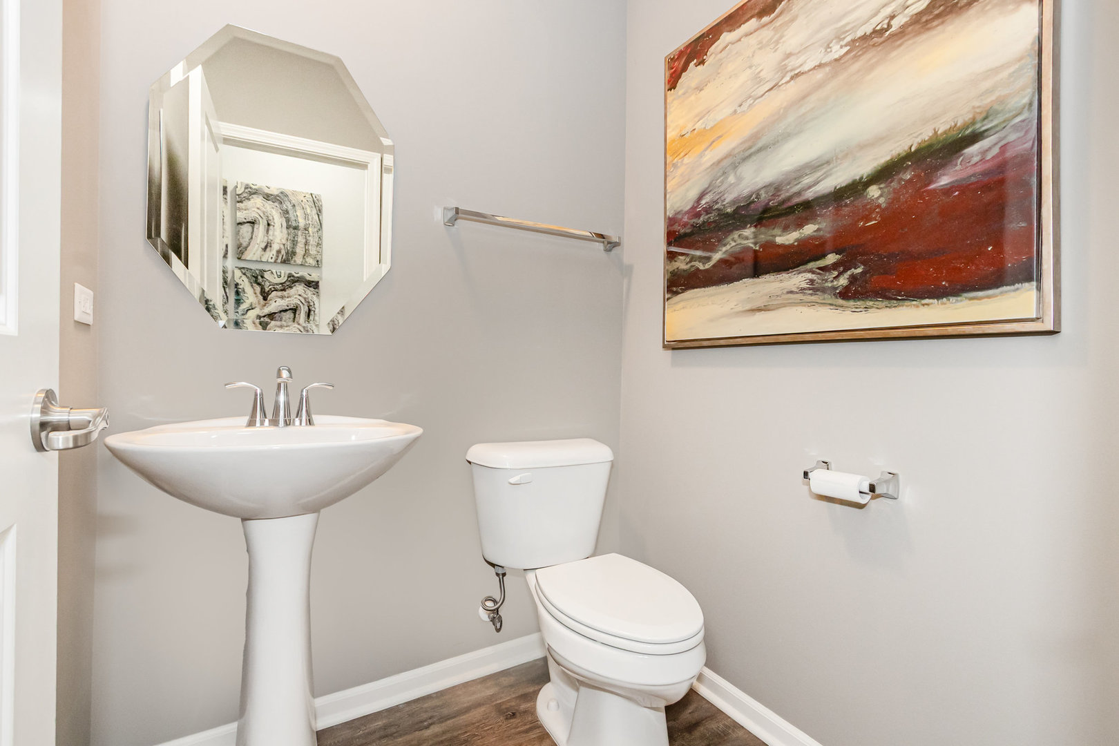 24724 McCormick Way Manhattan, IL 60442 - Photo 11 of 24 a bathroom with a toilet a sink and mirror