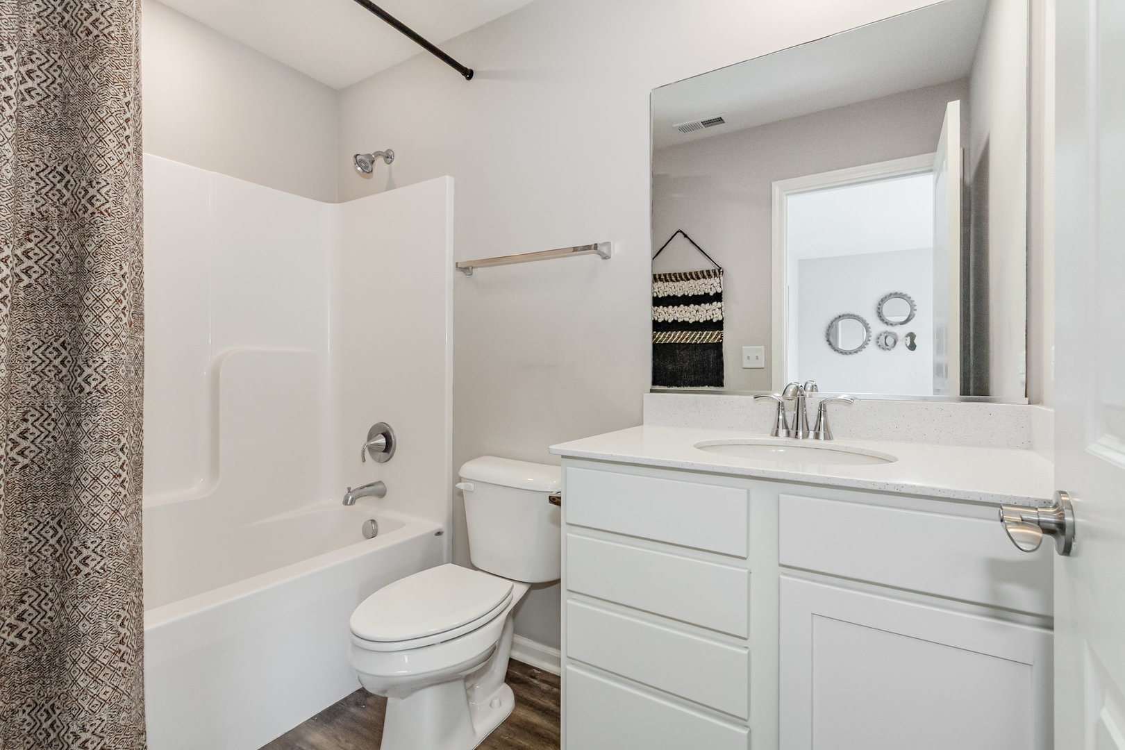 24724 McCormick Way Manhattan, IL 60442 - Photo 21 of 24 a bathroom with a sink toilet and shower
