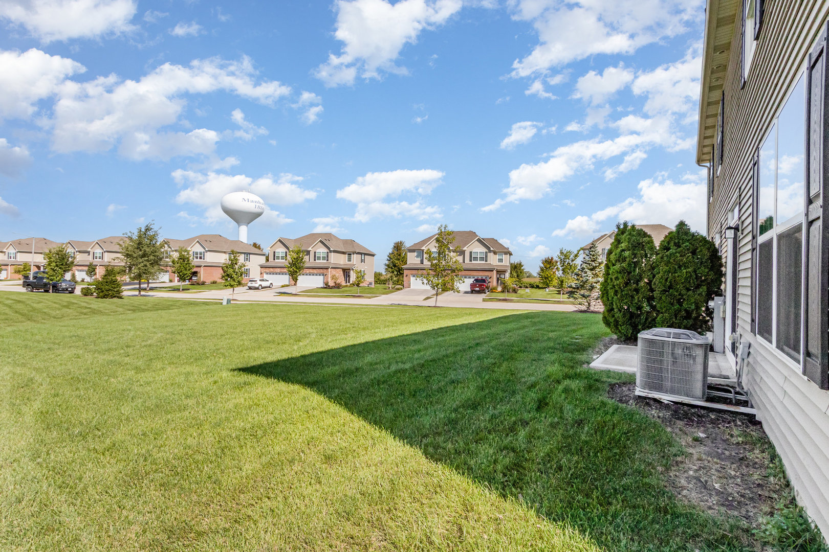 24724 McCormick Way Manhattan, IL 60442 - Photo 23 of 24 a view of yard with outdoor seating and green space