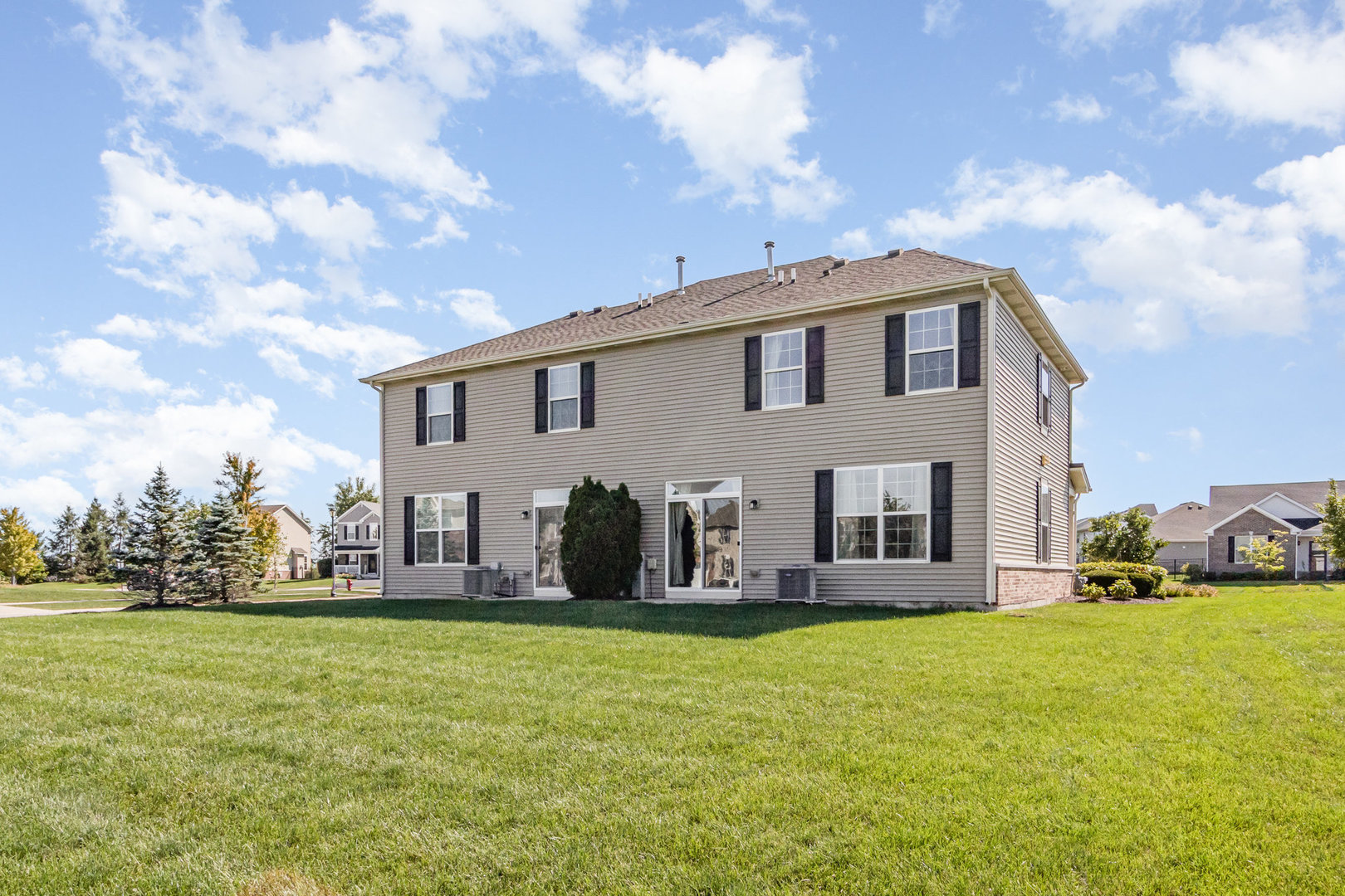 24724 McCormick Way Manhattan, IL 60442 - Photo 24 of 24 a front view of house with yard and car parked