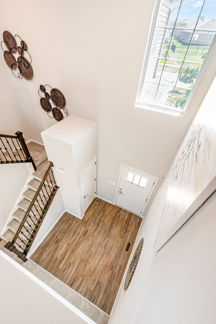 24724 McCormick Way Manhattan, IL 60442 - Photo 6 of 24 a bedroom with a bed and a window