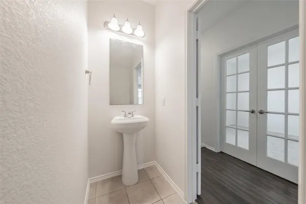 a bathroom with a toilet and a sink