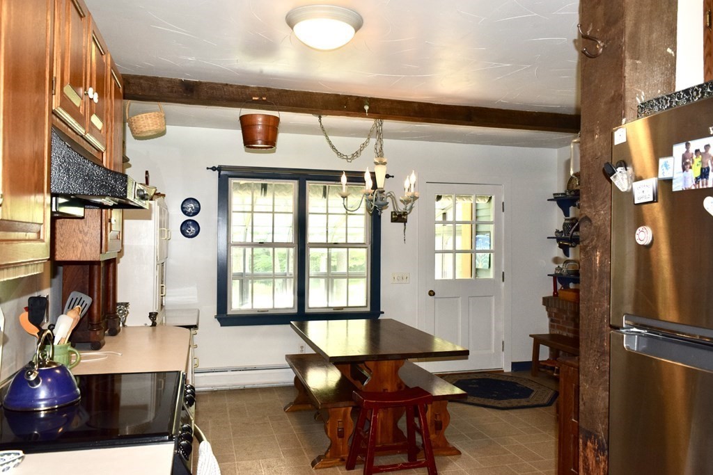 62 West Branch Road Ashfield, MA 01330 - Photo 11 of 42 a living room with furniture and a window