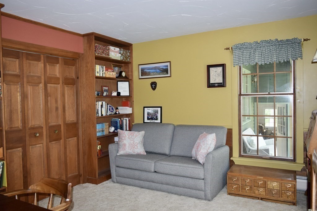 62 West Branch Road Ashfield, MA 01330 - Photo 23 of 42 a living room with furniture and a window