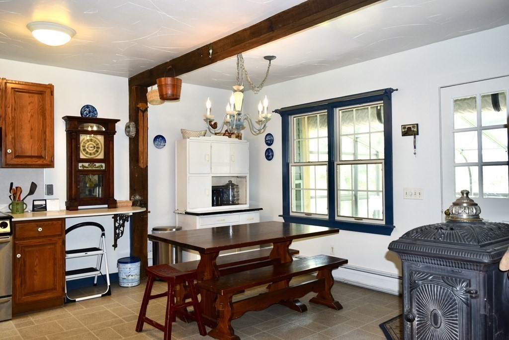 62 West Branch Road Ashfield, MA 01330 - Photo 8 of 42 a living room with furniture a piano and a window