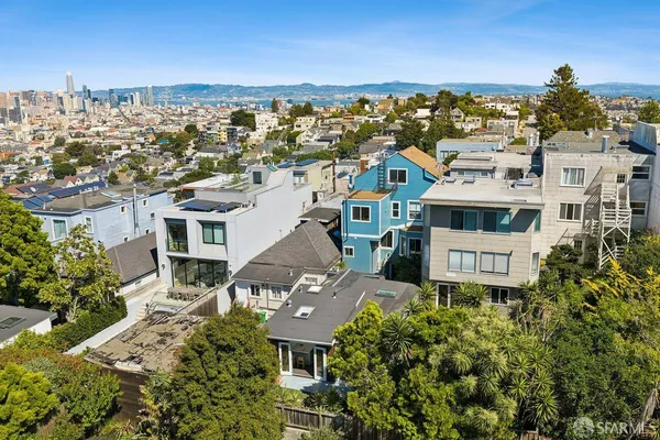an aerial view of multiple house