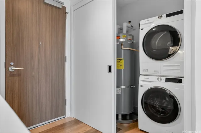 a view of a hallway with washer and dryer
