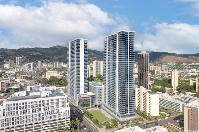 a view of city with tall buildings