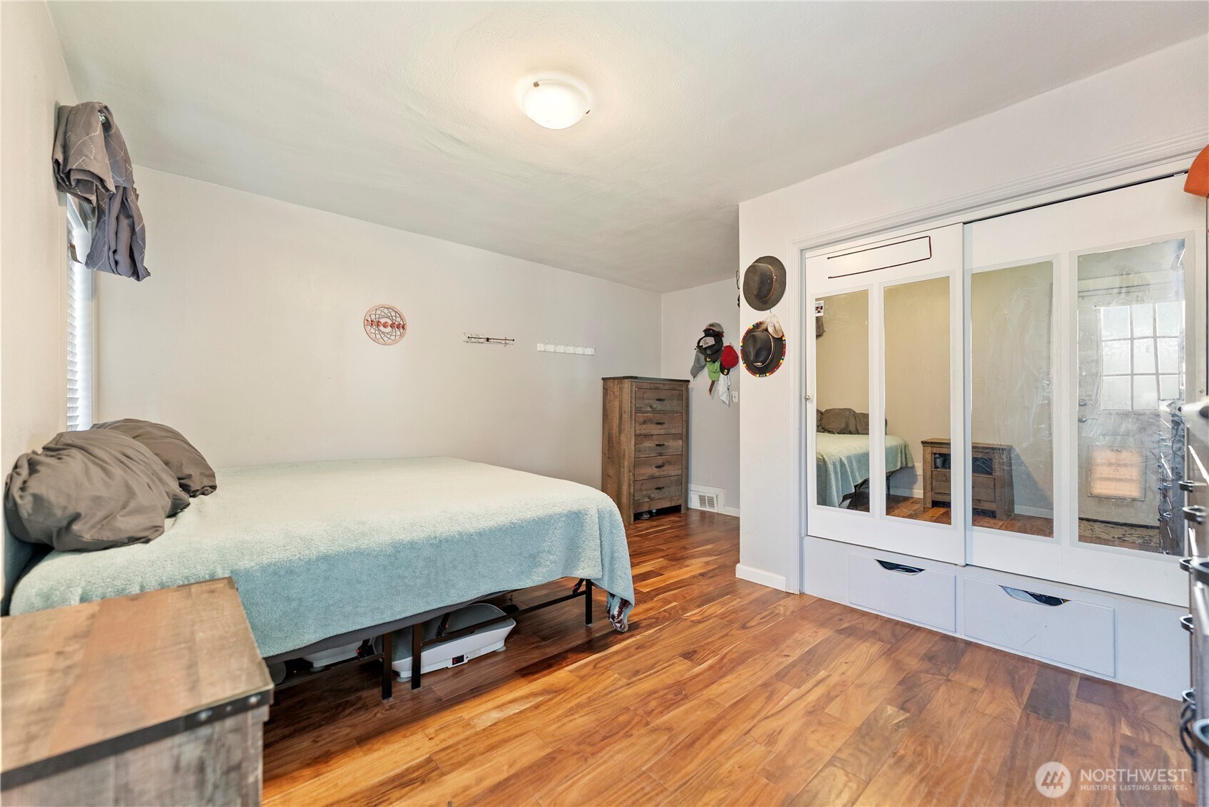 519 Locust Street Omak, WA 98841 - Photo 23 of 33 a bedroom with a bed and window