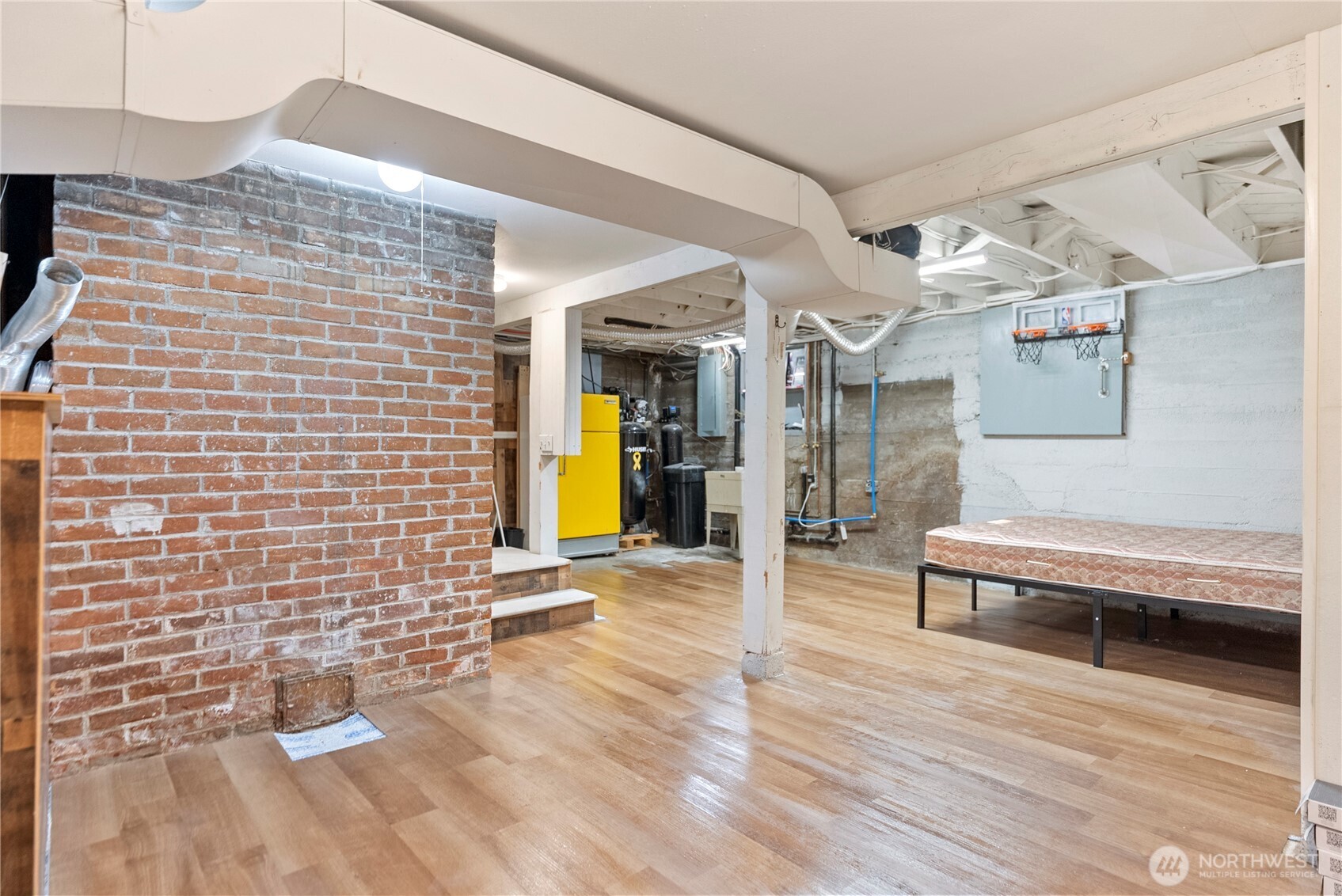 519 Locust Street Omak, WA 98841 - Photo 30 of 33 a spacious bathroom with a granite countertop sink and a mirror