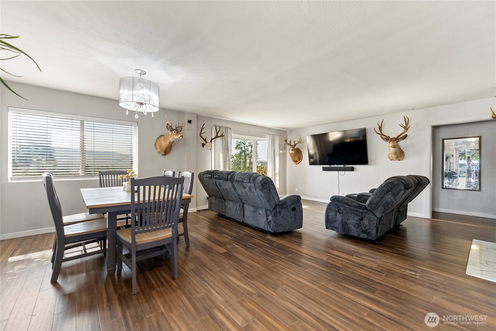 519 Locust Street Omak, WA 98841 - Photo 8 of 33 a living room with furniture and a flat screen tv