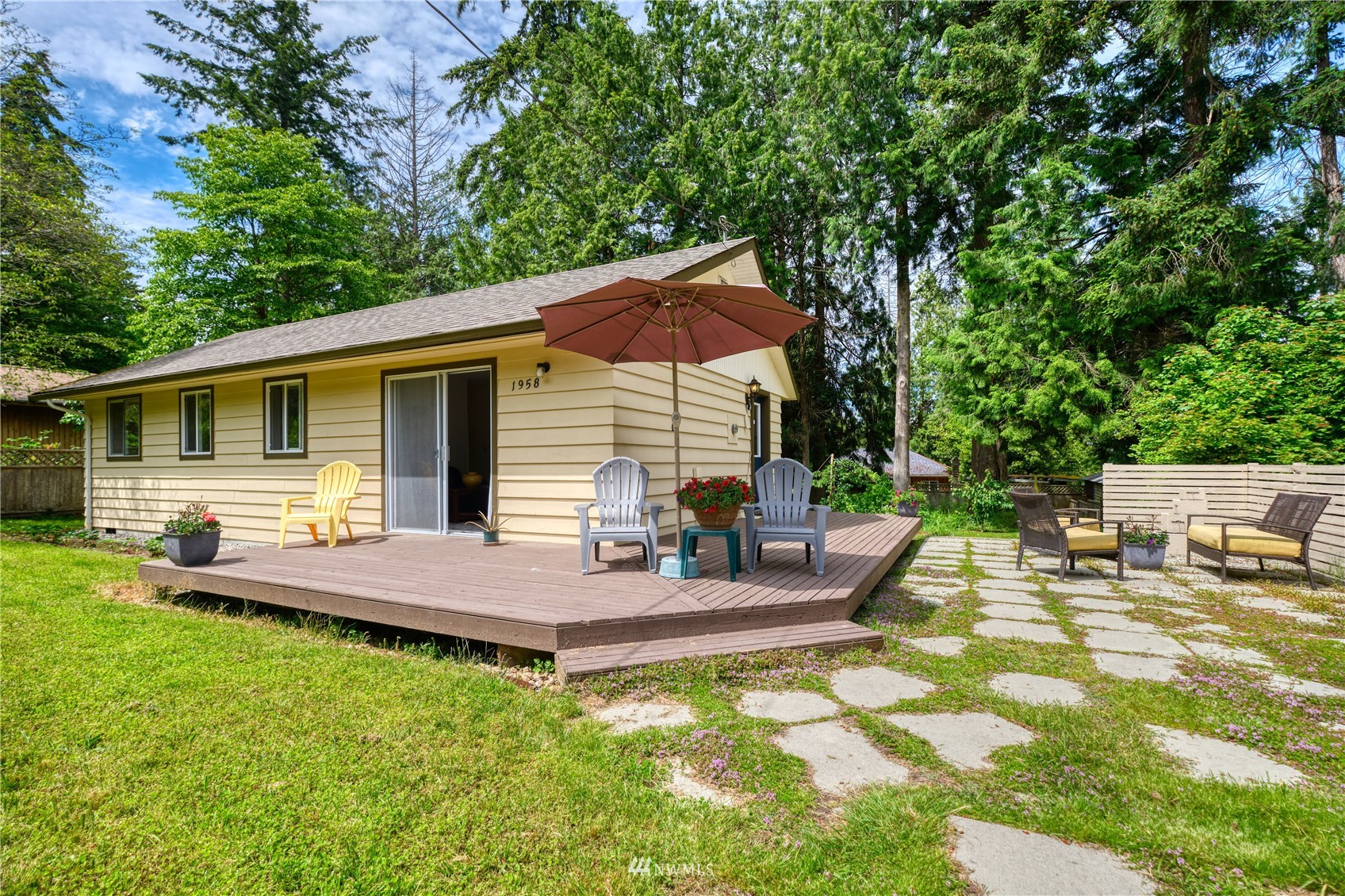1958 Wellington Road Point Roberts, WA 98281 - Photo 1 of 27 a view of house with backyard and sitting area