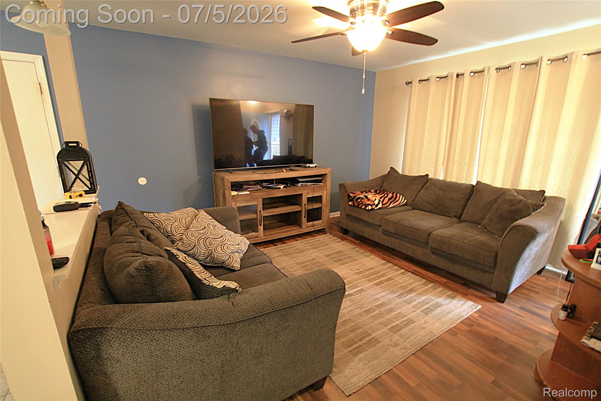 12403 Willard Road Montrose, MI 48457 - Photo 18 of 30 Living room featuring wood finished floors and ceiling fan