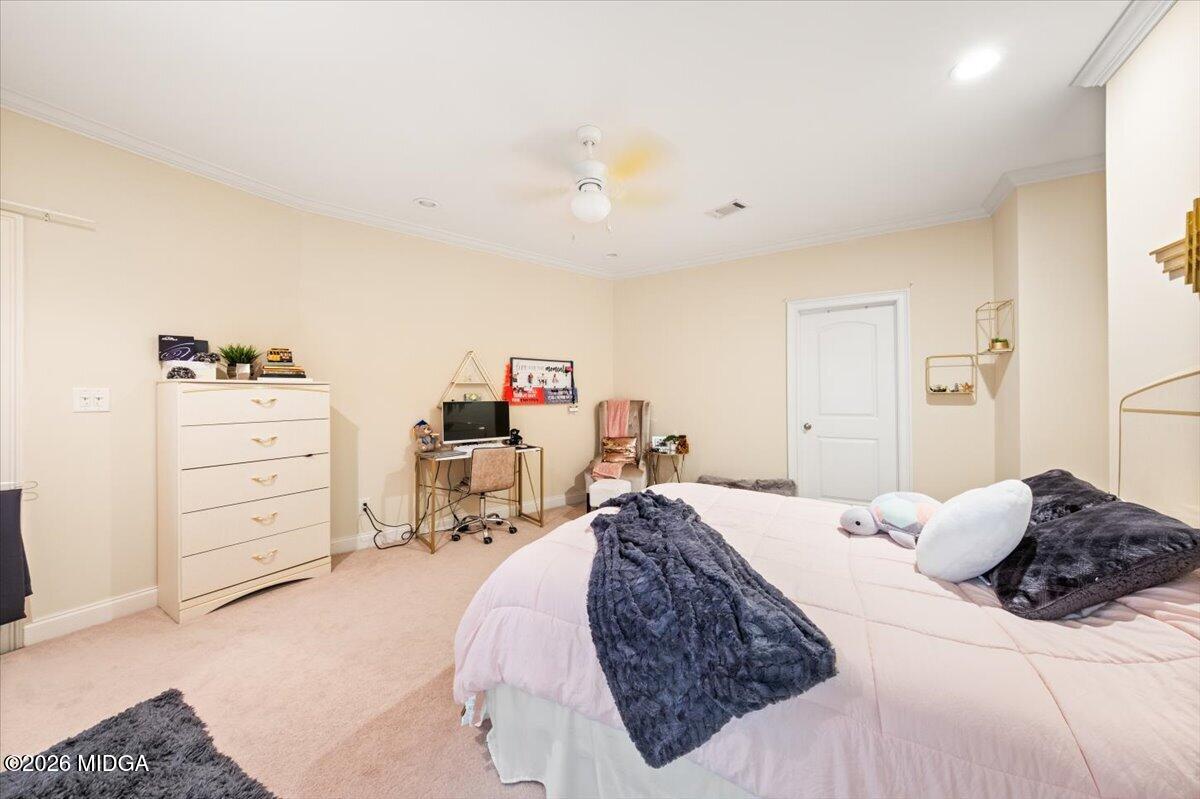 727 Latrobe Way Macon, GA 31220 - Photo 26 of 63 a bedroom with a bed and a dresser