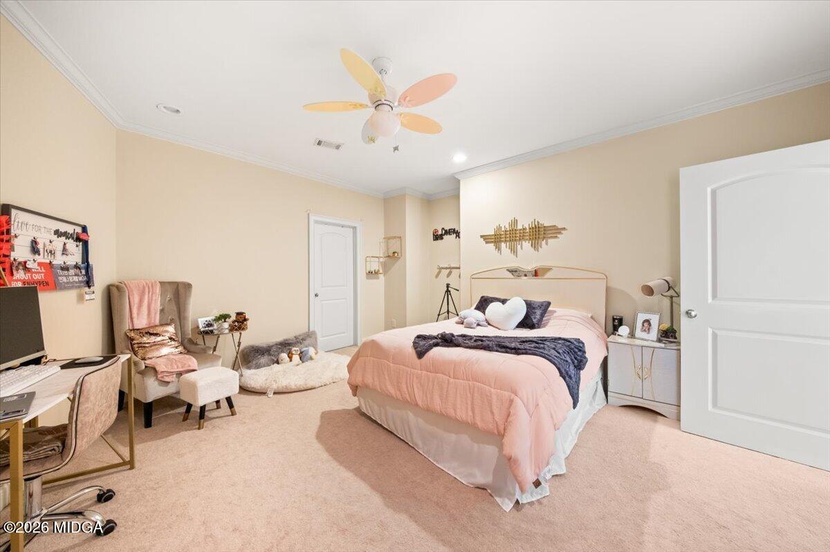 727 Latrobe Way Macon, GA 31220 - Photo 27 of 63 a bedroom with a bed and a window