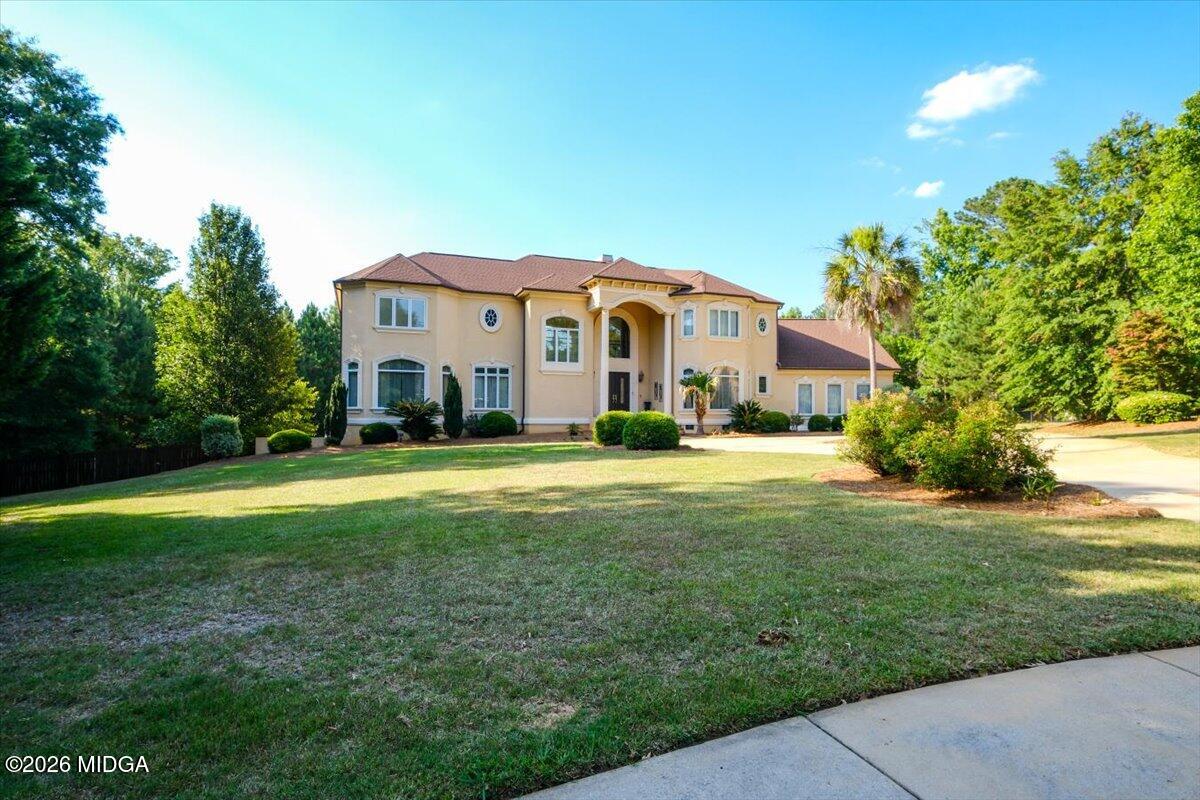 727 Latrobe Way Macon, GA 31220 - Photo 41 of 63 a front view of a house with a yard