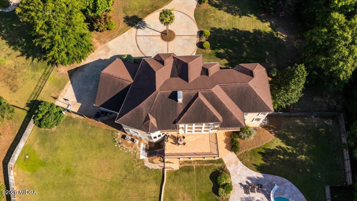 727 Latrobe Way Macon, GA 31220 - Photo 45 of 63 an aerial view of a house with swimming pool and garden