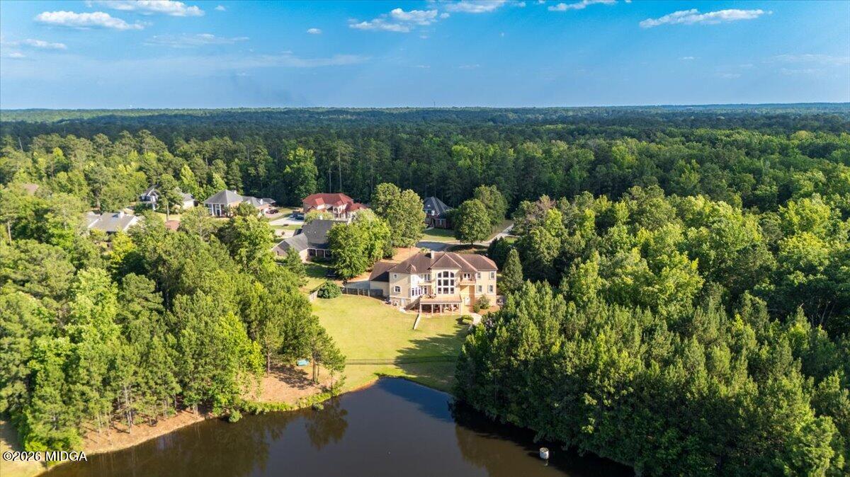 727 Latrobe Way Macon, GA 31220 - Photo 55 of 63 a view of a lake with a city