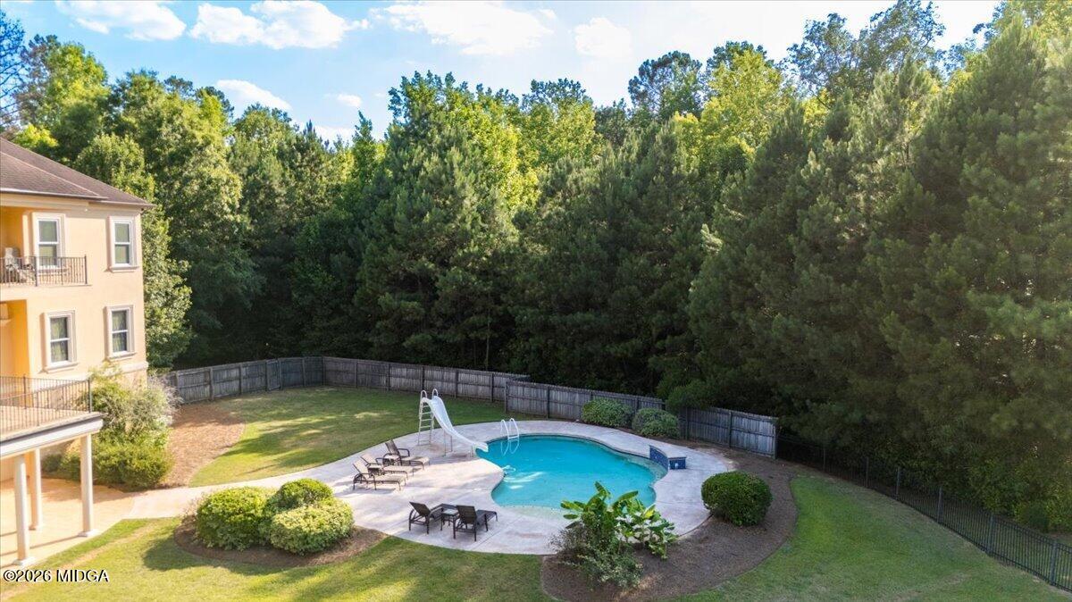 727 Latrobe Way Macon, GA 31220 - Photo 56 of 63 a view of a swimming pool with a yard