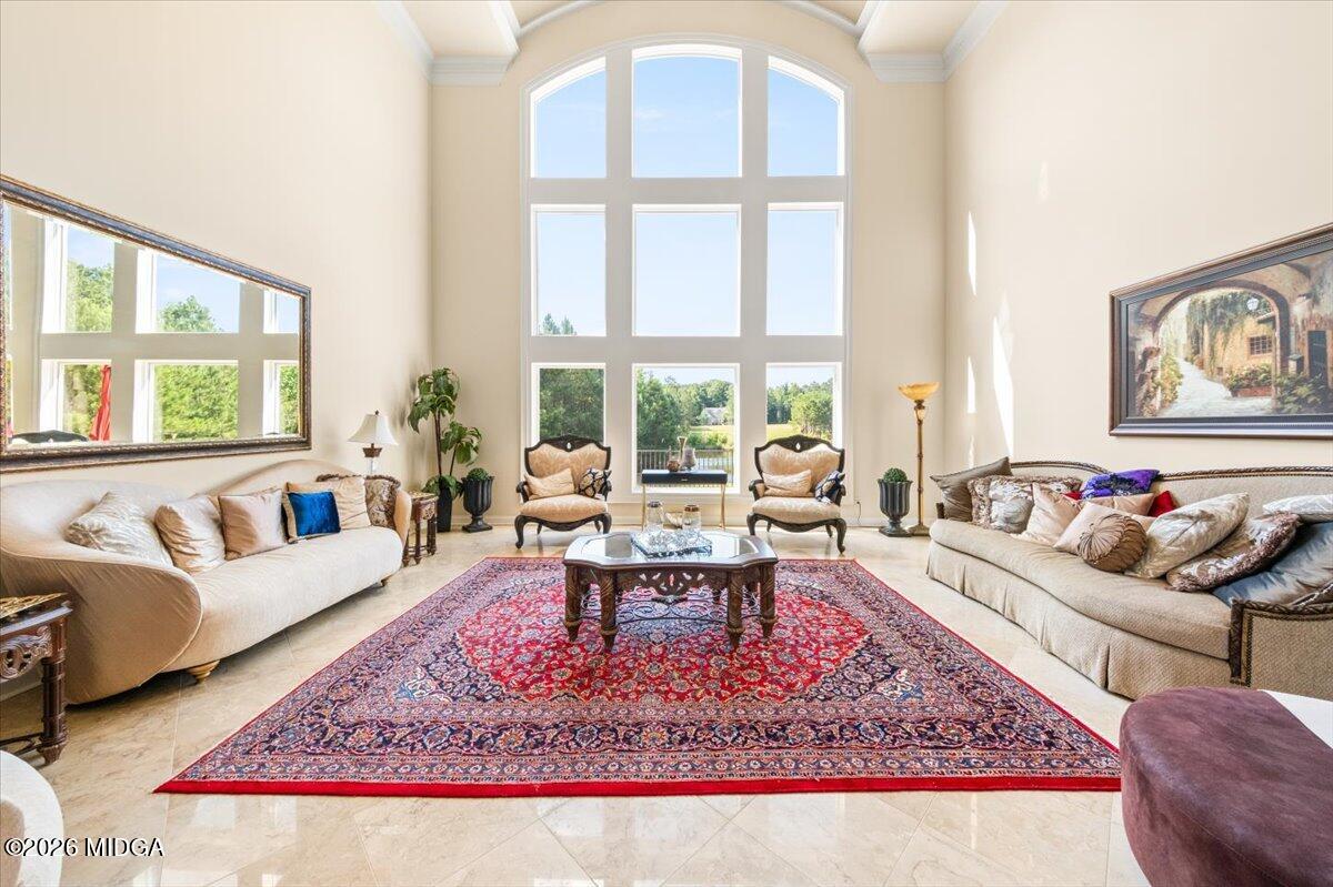 727 Latrobe Way Macon, GA 31220 - Photo 6 of 63 a living room with furniture and a rug