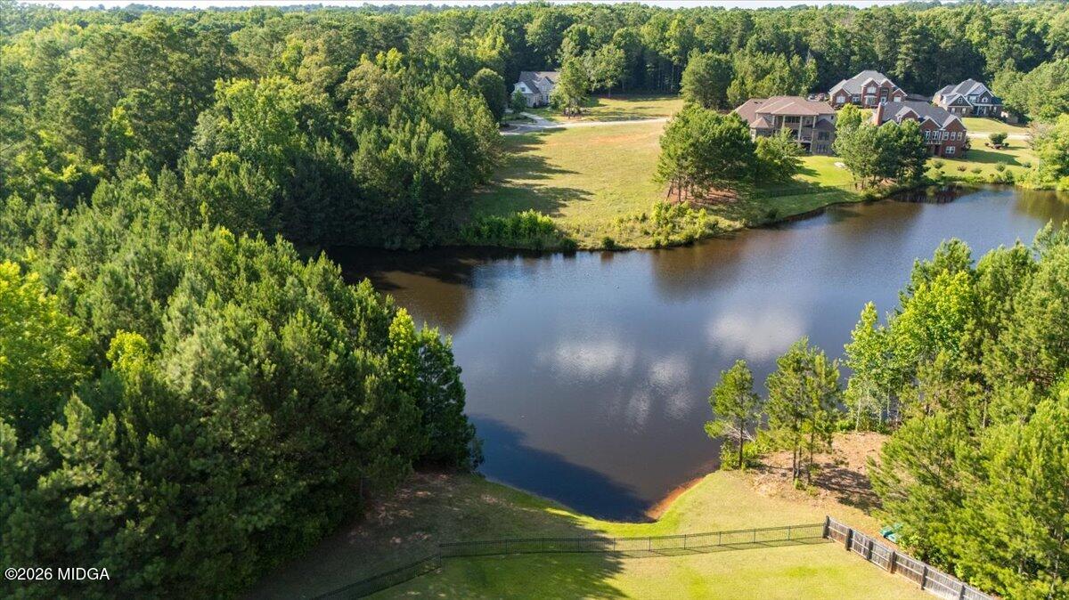 727 Latrobe Way Macon, GA 31220 - Photo 63 of 63 a view of a lake with houses