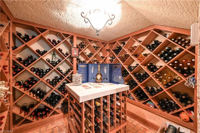 a view of a patio with a table and chairs