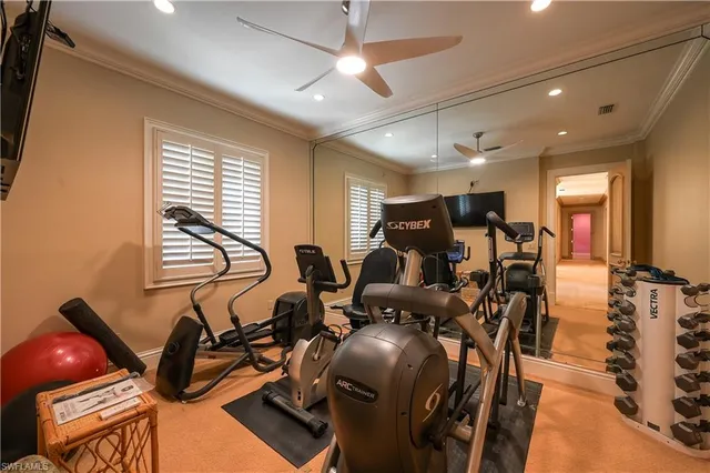 a kitchen with a stove a sink and a refrigerator
