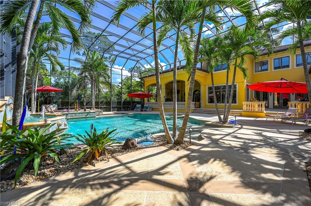 683 Hickory Road Naples, FL 34108 - Photo 3 of 42 a view of street with palm trees