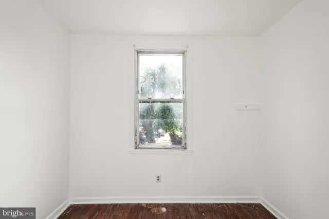 an empty room with window