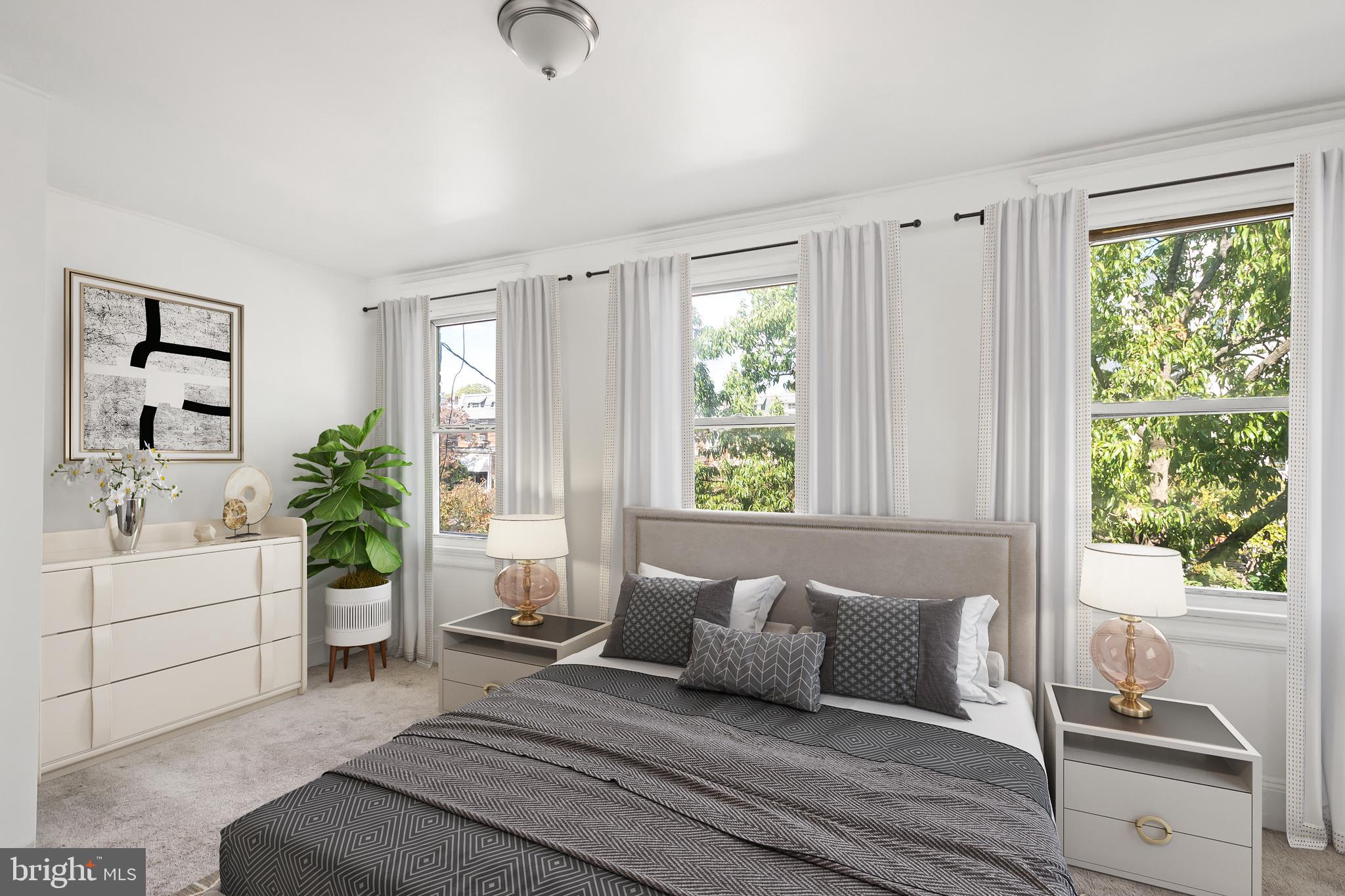 1214 Kennedy Street Northwest Washington, DC 20011 - Photo 15 of 34 a living room with furniture and a large window