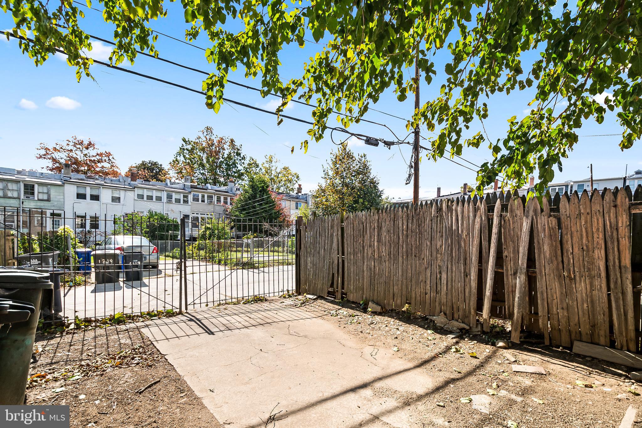 1214 Kennedy Street Northwest Washington, DC 20011 - Photo 29 of 34 a view of a backyard with a patio