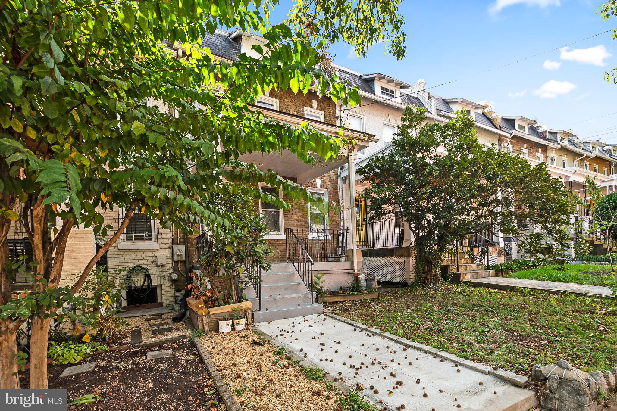 1214 Kennedy Street Northwest Washington, DC 20011 - Photo 30 of 34 a front view of a house with garden