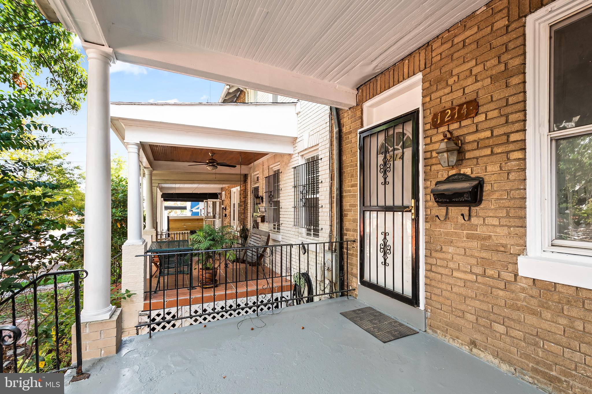 1214 Kennedy Street Northwest Washington, DC 20011 - Photo 3 of 34 front view of a house with a glass door