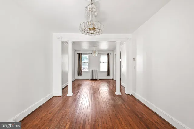 a view of gallery with wooden floor
