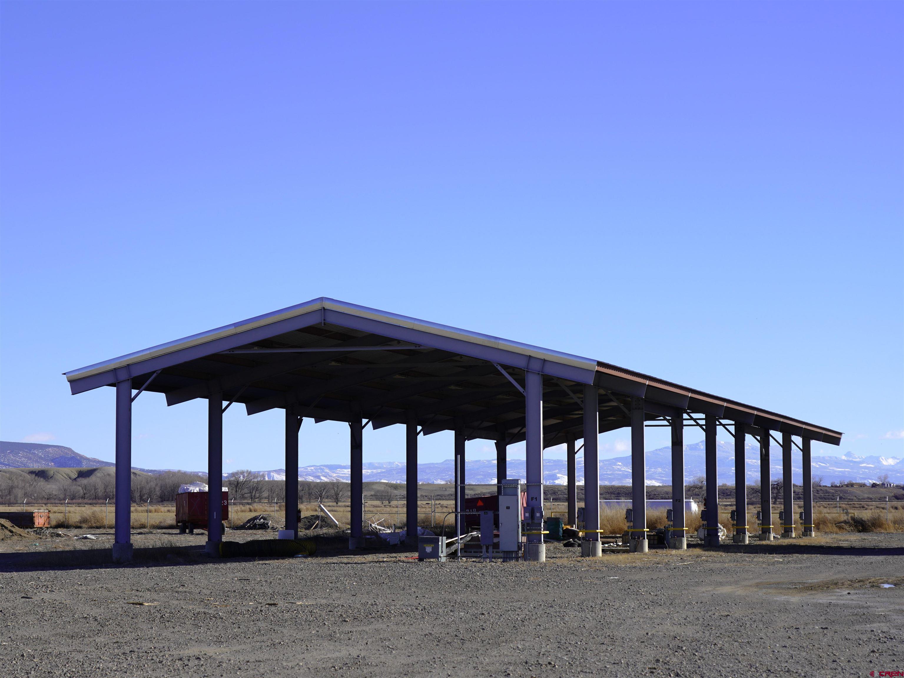 a view of a chair and table in the patio