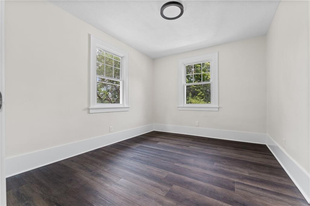 5 Winding Road Leetsdale, PA 15056 - Photo 30 of 50 an empty room with wooden floor and windows