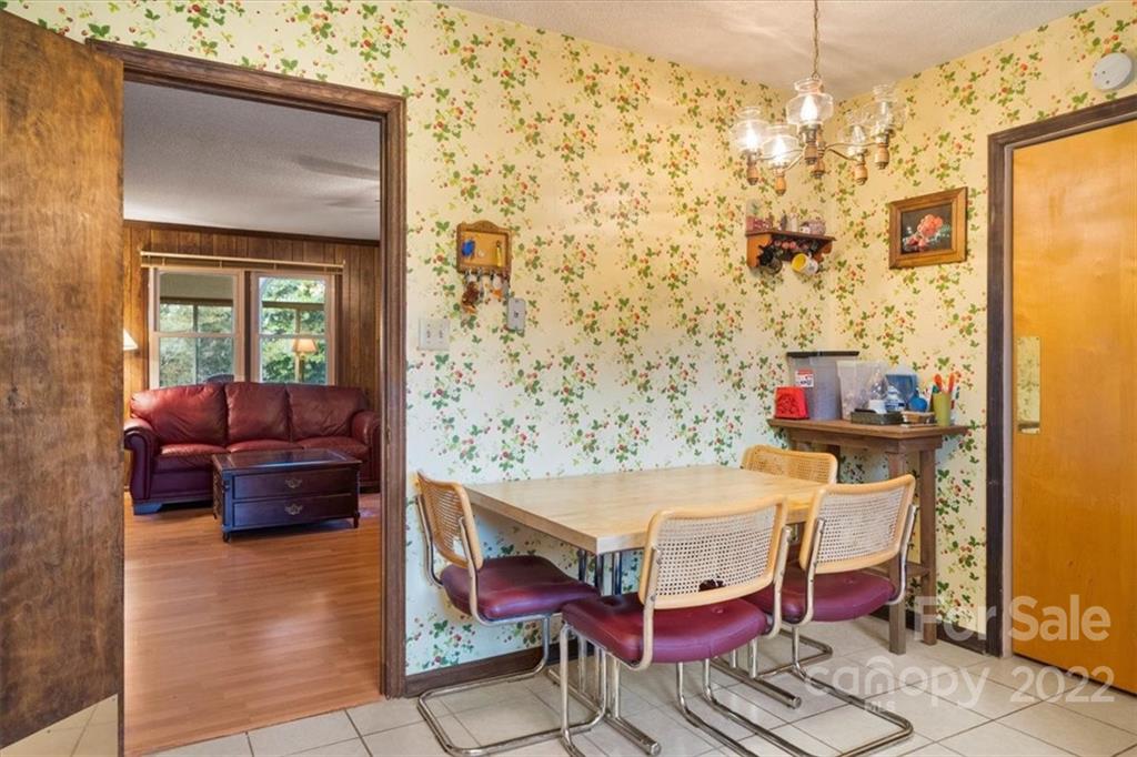 1552 Allen Lane Conover, NC 28613 - Photo 15 of 38 a bedroom with a bed and wooden floor