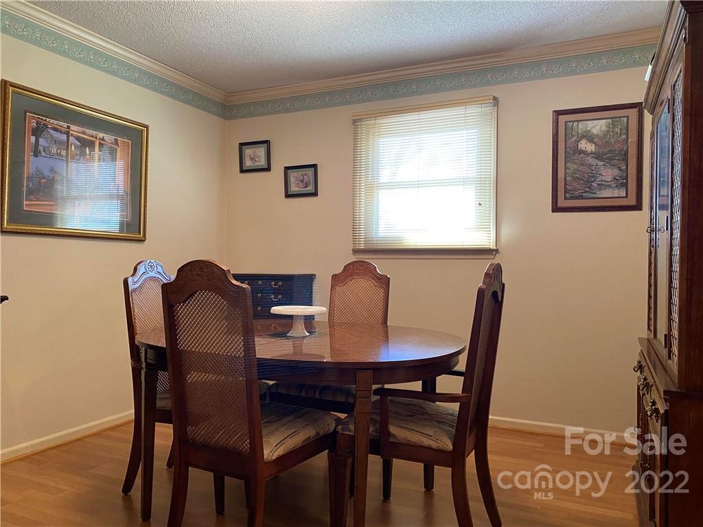 1552 Allen Lane Conover, NC 28613 - Photo 16 of 38 a view of a dining room with furniture and window