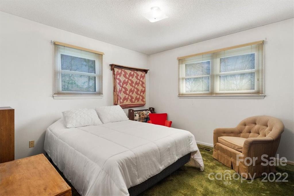 1552 Allen Lane Conover, NC 28613 - Photo 21 of 38 a bedroom with a bed and a couch