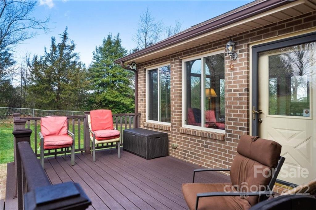 1552 Allen Lane Conover, NC 28613 - Photo 27 of 38 a couple of chairs sitting in front of a house